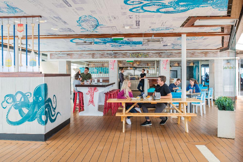 Fish & Ships on board Ovation of the Seas is a seaside seafood spot that serves up freshly battered fish and chips and other guest favorites.