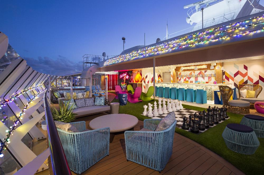 Teens on board Wonder of the Seas can kick back at their very own indoor and outdoor spaces, Social100 and The Patio.