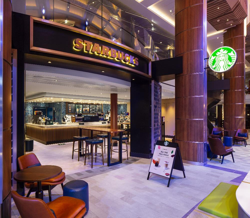 In the Royal Esplanade, filled with restaurants, shops and more, Starbucks makes its Quantum and Quantum Ultra Class debut on board Odyssey of the Seas .